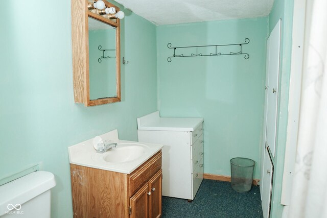 307 N Main St, Carthage, IN 46115 - bathroom featuring toilet and vanity