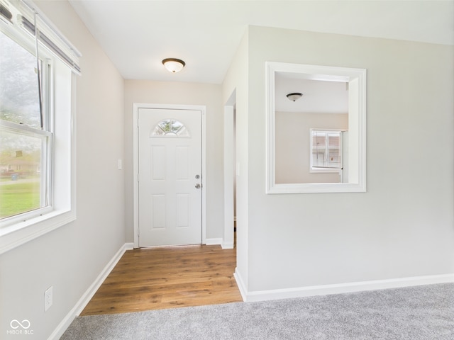 979 Monroe St, Indianapolis, IN 46229 - entryway with baseboards and wood finished floors