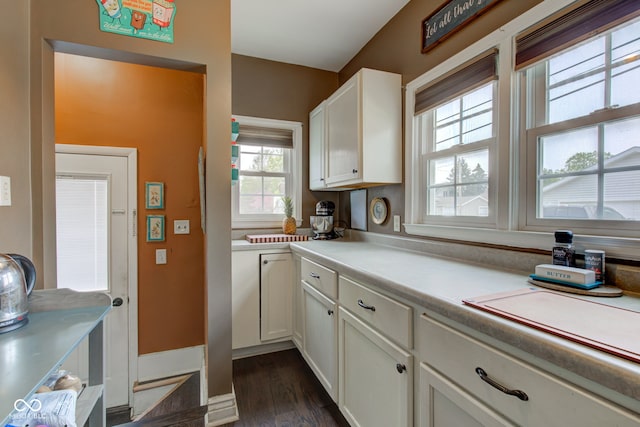 120 W S St, Tipton, IN 46072 - kitchen with light countertops, dark wood-style flooring, and white cabinetry