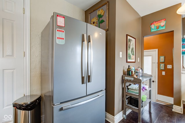 120 W S St, Tipton, IN 46072 - kitchen with freestanding refrigerator, baseboards, and dark wood-style floors
