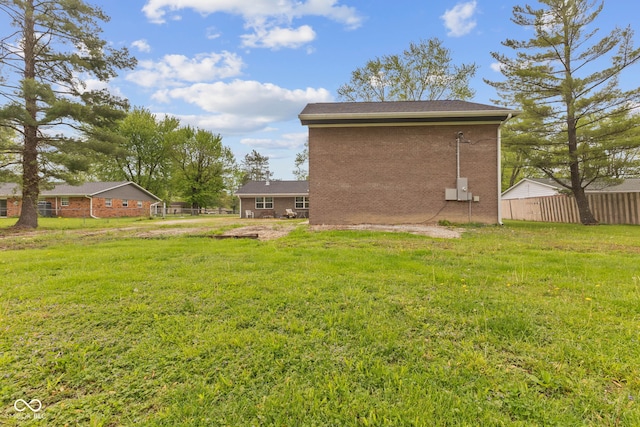 view of yard with fence
