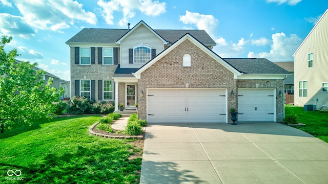 view of front of property featuring an attached garage, concrete driveway, a front yard, roof with shingles, and brick siding