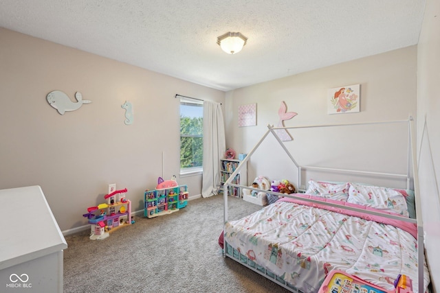bedroom featuring carpet floors, baseboards, and a textured ceiling