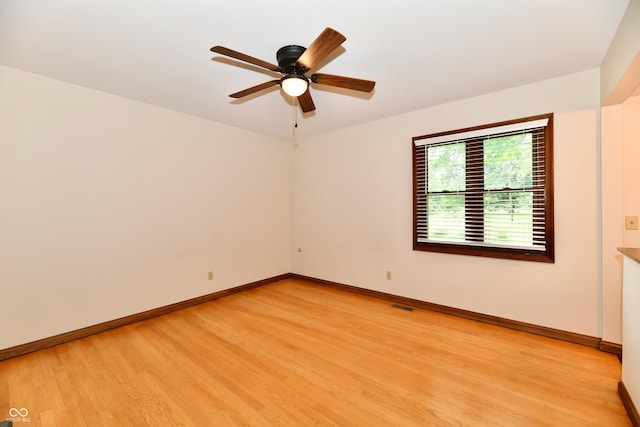12087 N Gasburg Rd, Mooresville, IN 46158 - empty room featuring light wood-style flooring and ceiling fan