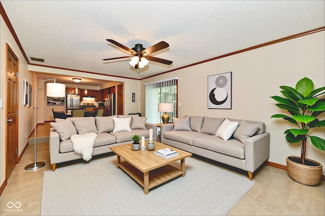 12087 N Gasburg Rd, Mooresville, IN 46158 - living area featuring light tile patterned flooring, a ceiling fan, and crown molding