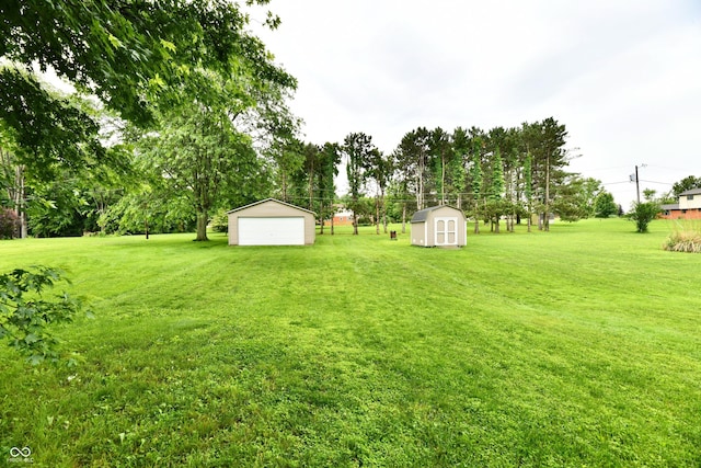 12087 N Gasburg Rd, Mooresville, IN 46158 - view of grassy yard with a storage unit and a garage