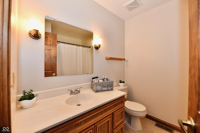 12087 N Gasburg Rd, Mooresville, IN 46158 - bathroom with vanity and toilet