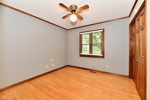 12087 N Gasburg Rd, Mooresville, IN 46158 - unfurnished room featuring light wood-type flooring, ceiling fan, and crown molding