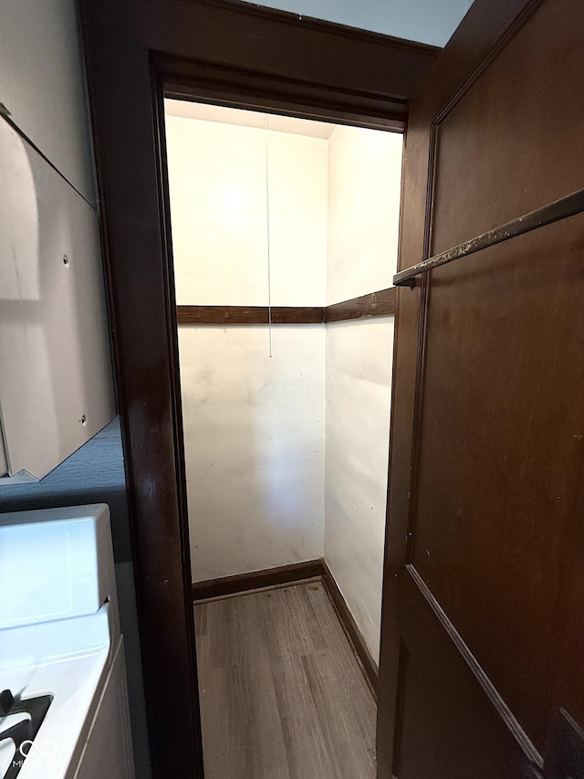 324 E Southern Ave, Indianapolis, IN 46225 - spacious closet with wood finished floors and separate washer and dryer