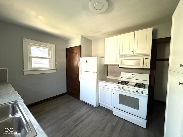 324 E Southern Ave, Indianapolis, IN 46225 - kitchen with white appliances, white cabinets, light countertops, dark wood-type flooring, and a sink