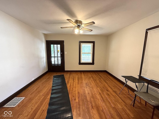 324 E Southern Ave, Indianapolis, IN 46225 - foyer with wood finished floors, ceiling fan, and baseboards