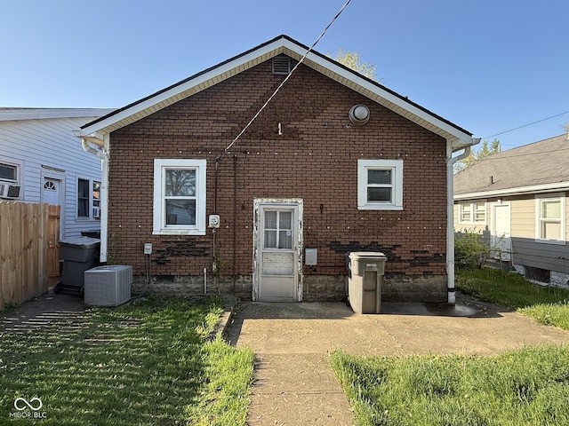 324 E Southern Ave, Indianapolis, IN 46225 - back of property featuring central AC and brick siding