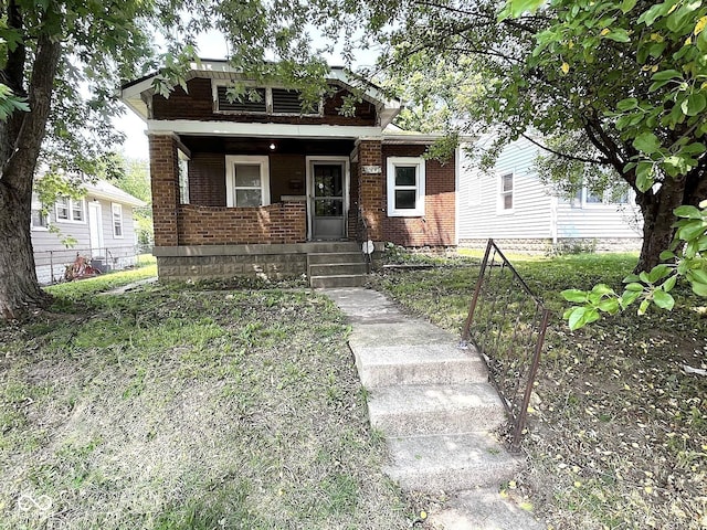 324 E Southern Ave, Indianapolis, IN 46225 - view of front of home with brick siding and covered porch