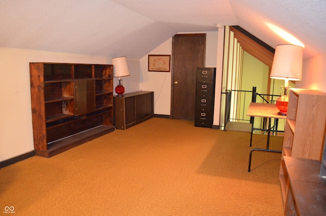 931 Beech Dr, Greenwood, IN 46142 - interior space featuring baseboards, carpet, and vaulted ceiling