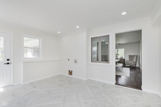 spare room with crown molding, recessed lighting, baseboards, and parquet floors
