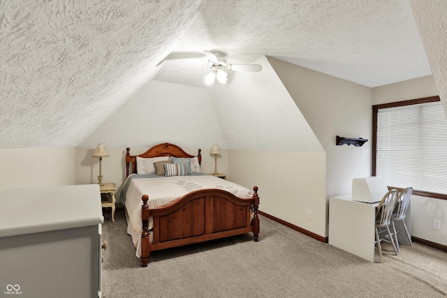 bedroom with carpet, ceiling fan, and a textured ceiling