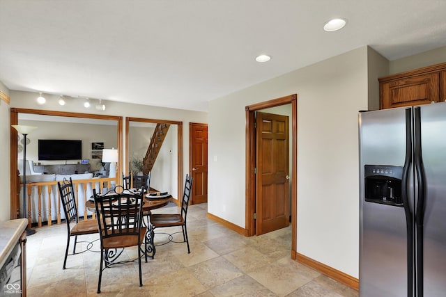 dining area with baseboards and recessed lighting