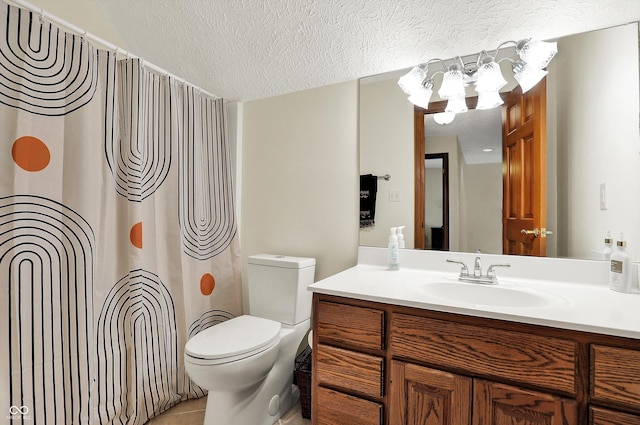 full bath with a notable chandelier, a textured ceiling, toilet, tile patterned floors, and vanity