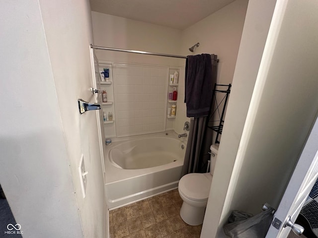 full bathroom featuring toilet and shower / washtub combination