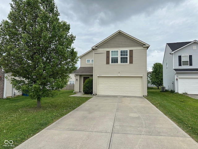 view of front of home featuring a garage, central AC unit, driveway, and a front lawn