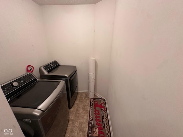 laundry room featuring laundry area and washer and dryer