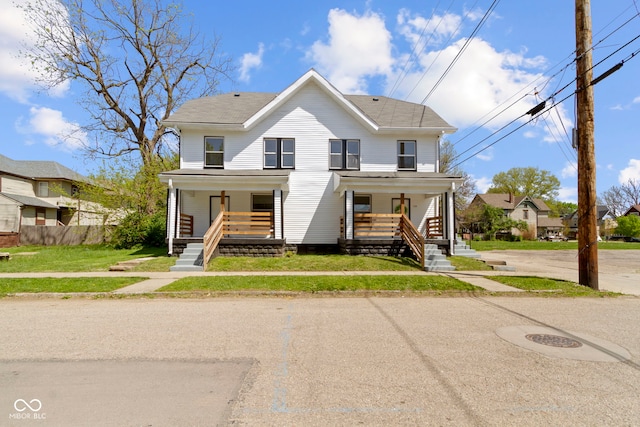 view of front facade featuring a porch and a front yard