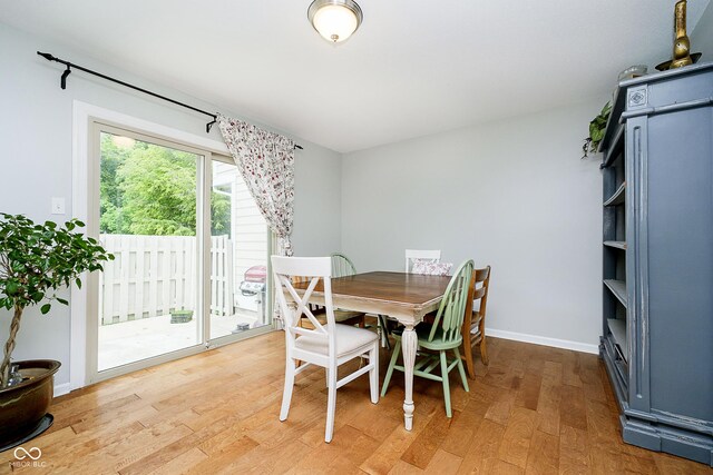 162 Carmelaire Dr, Carmel, IN 46032 - dining room featuring light wood-style flooring and baseboards