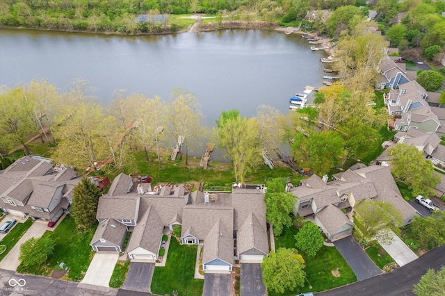 aerial view with a residential view and a water view
