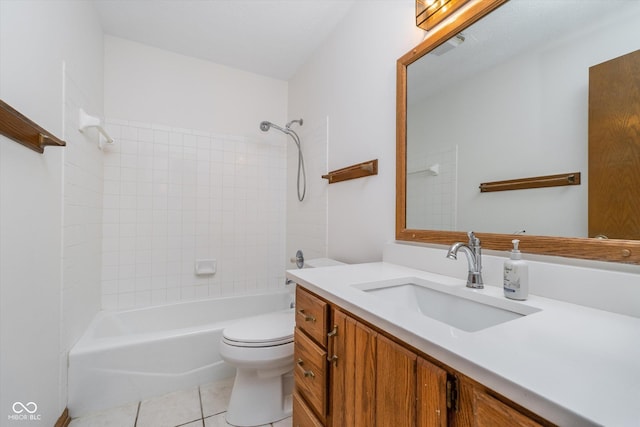 full bathroom with tile patterned flooring, tub / shower combination, toilet, and vanity