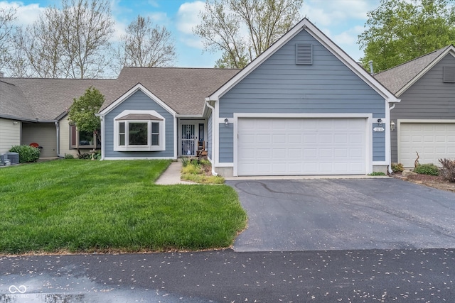 single story home with roof with shingles, a front lawn, a garage, cooling unit, and driveway