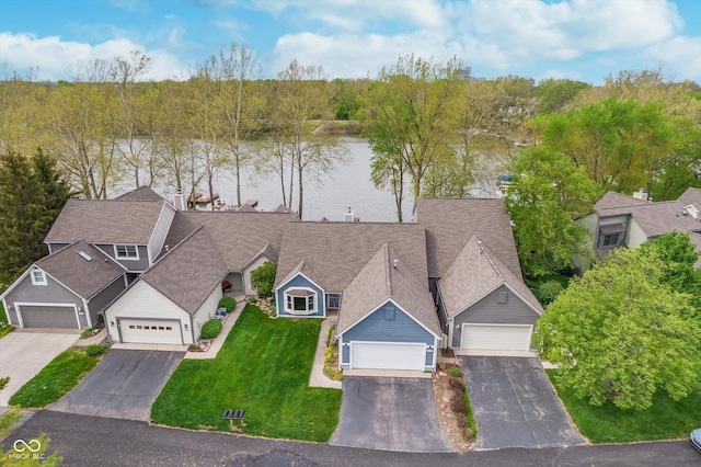 birds eye view of property featuring a water view