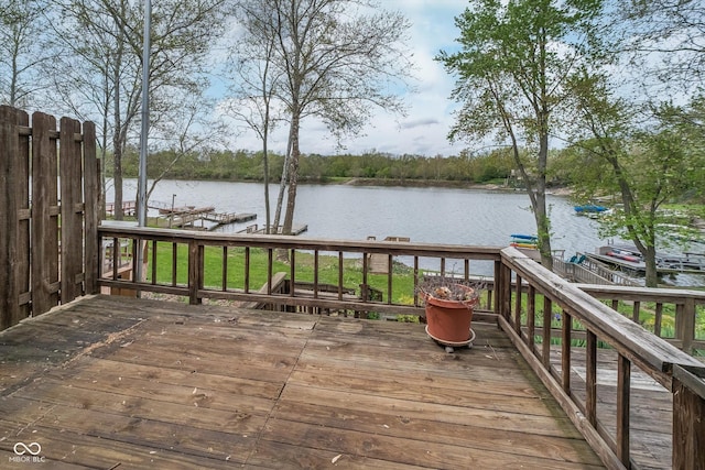 wooden terrace with a water view