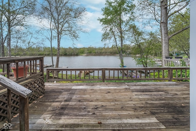 deck featuring a water view