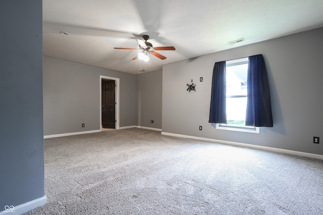 625 Maple St, Columbus, IN 47201 - empty room featuring a ceiling fan, baseboards, and carpet floors