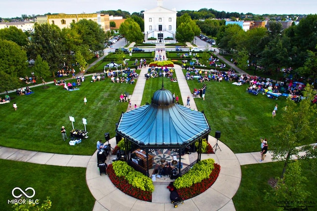 view of home's community with a gazebo and a lawn