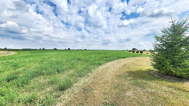 exterior space with a rural view