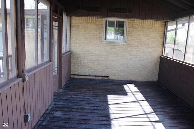 unfurnished sunroom with a healthy amount of sunlight