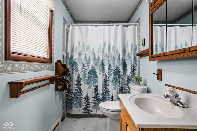 bathroom featuring vanity, a textured ceiling, toilet, and curtained shower