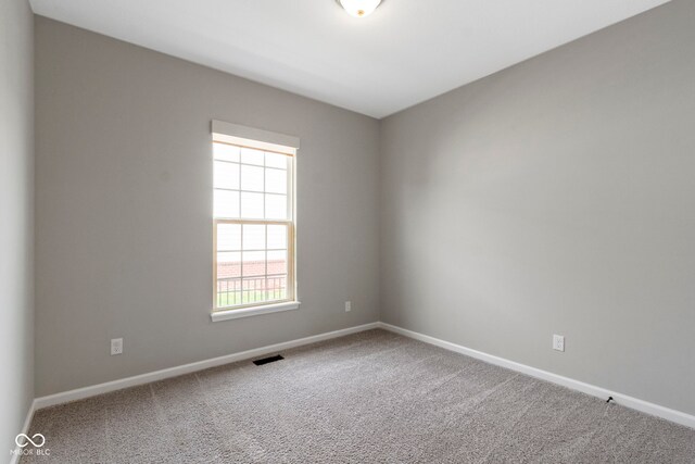 11595 Platt St, Noblesville, IN 46060 - empty room with carpet floors and baseboards