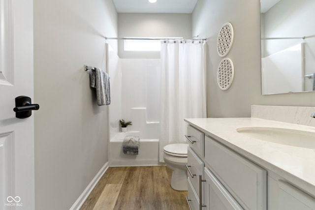 11595 Platt St, Noblesville, IN 46060 - full bathroom with vanity, wood finished floors, toilet, and shower / tub combo with curtain