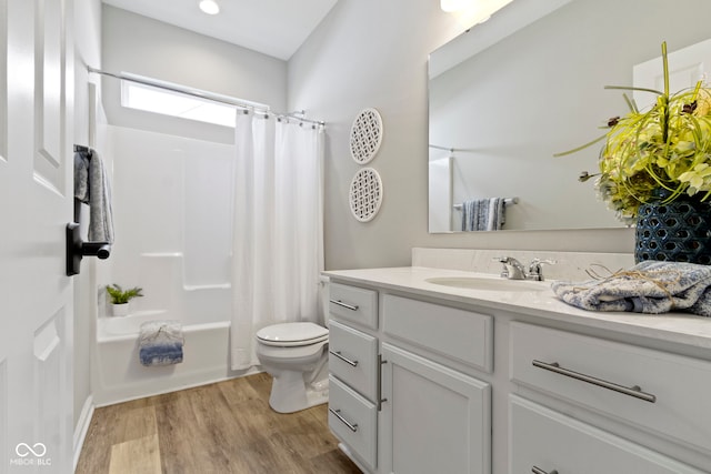 11595 Platt St, Noblesville, IN 46060 - full bathroom featuring vanity, toilet, wood finished floors, and shower / tub combo with curtain