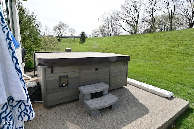 view of patio with a hot tub