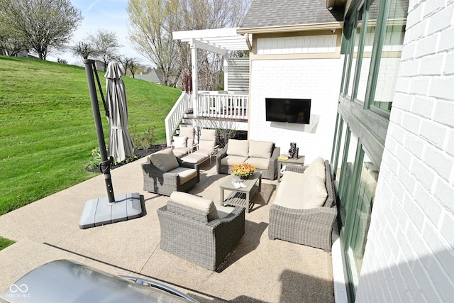view of patio / terrace with an outdoor living space and a pergola