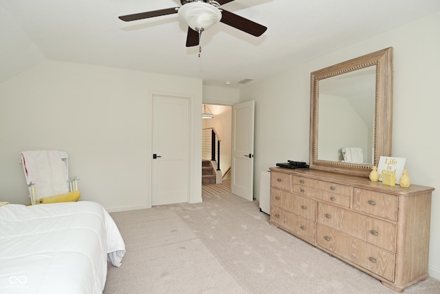 bedroom with light colored carpet, baseboards, a ceiling fan, and visible vents