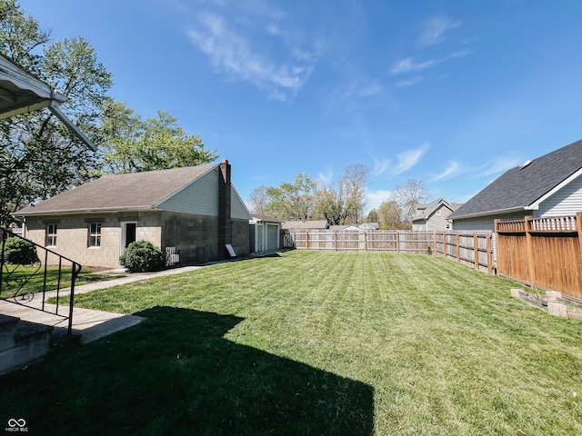 view of yard featuring a fenced backyard