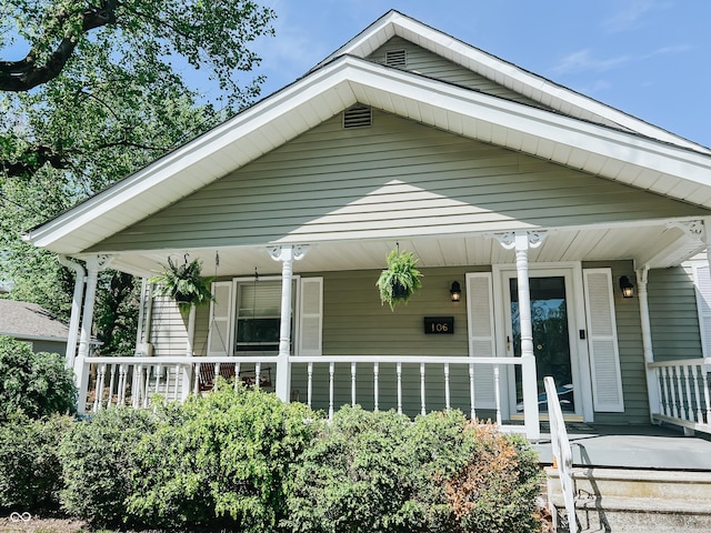 bungalow-style house featuring covered porch