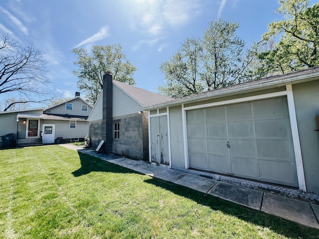 view of side of property with a yard