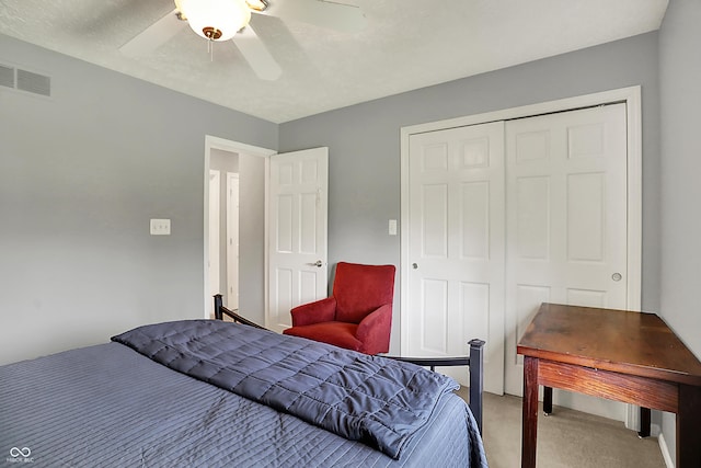 601 Shady Ln, Greenwood, IN 46142 - bedroom with visible vents, a ceiling fan, carpet, and a closet