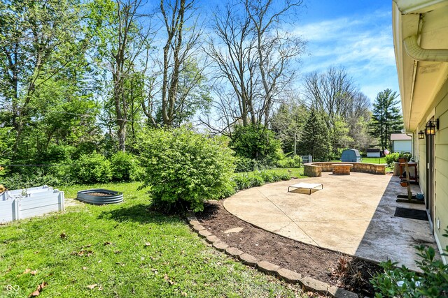 601 Shady Ln, Greenwood, IN 46142 - view of yard with a patio and an outdoor fire pit
