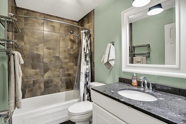 601 Shady Ln, Greenwood, IN 46142 - full bathroom featuring toilet, a textured ceiling, shower / bath combination with curtain, and vanity